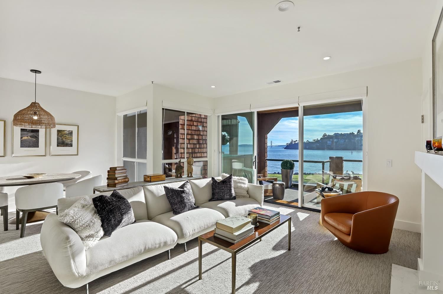 Custom built-in bed niche on the lower level, with warm wood paneling and reading lights.