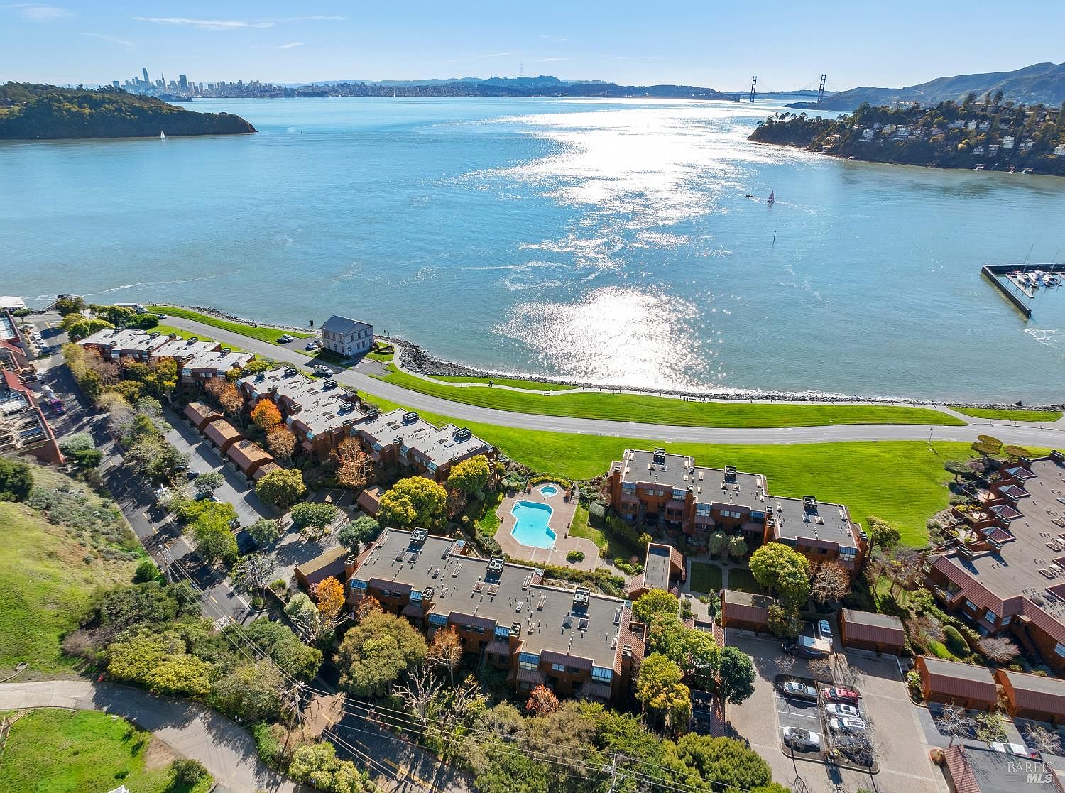 Deep-water berth at the doorstep of 68 Issaquah Dock, with the residence's dock entry framed by the boardwalk and bay.